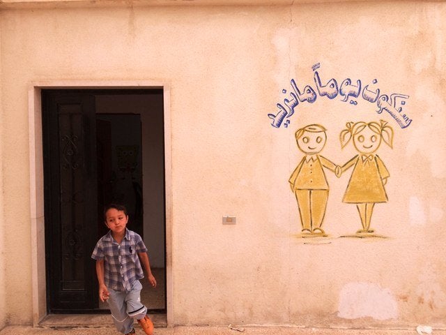 A Syrian child at an informal school for refugee kids in Lebanon's Bekaa Valley.