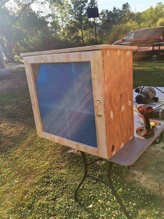 The Little Free Pantry being built.