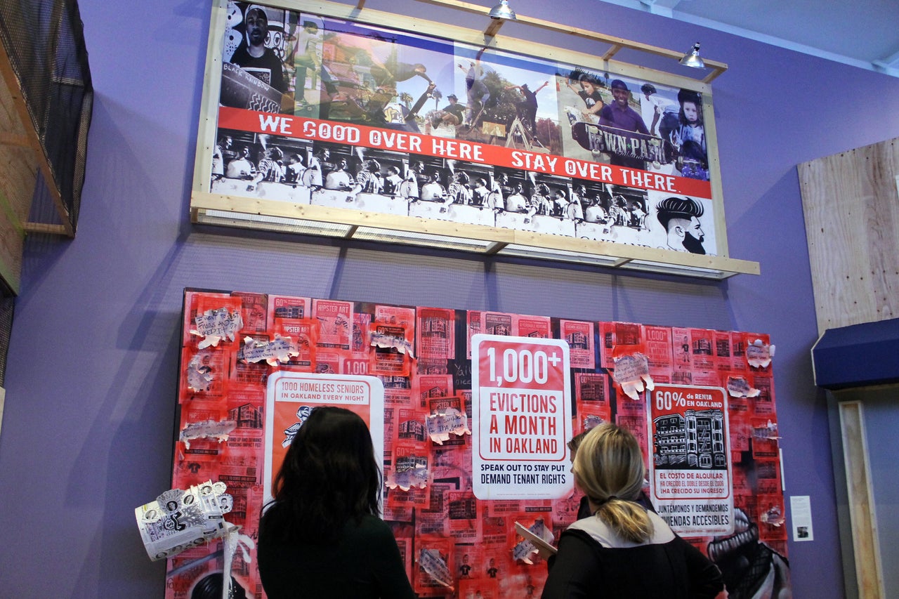 Museum visitors learn about tenant rights at the "Oakland, I want you to know..." show.