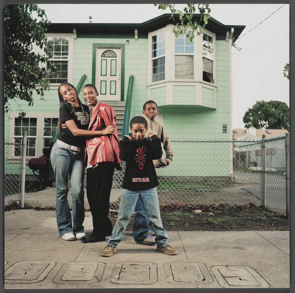 “952 Chester Street,” a 16x16 giclee print from 2003 by Julie Placensia, is included in the exhibition “Oak