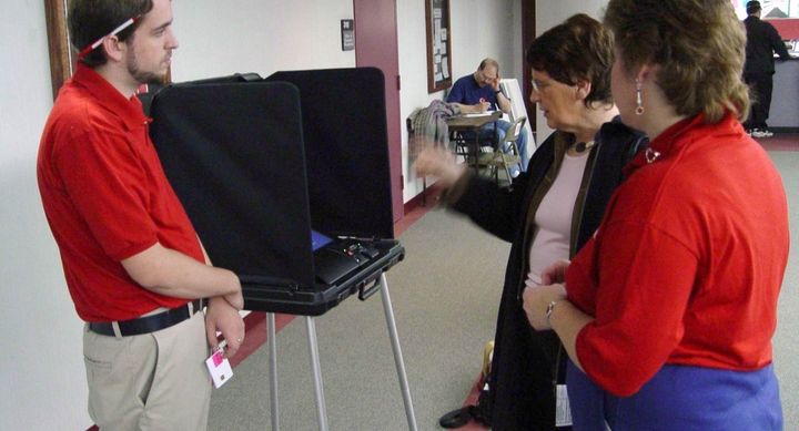 A naive woman prepares to 'vote'