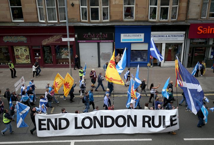 <strong>One banner read 'end London rule'.</strong>
