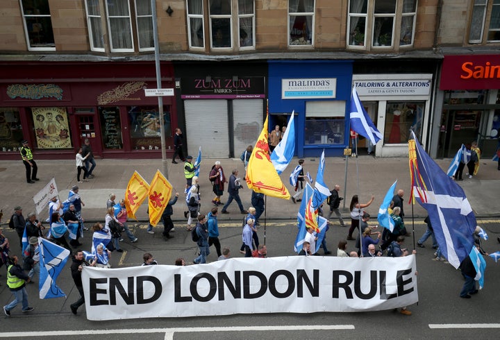 <strong>One banner read 'end London rule'.</strong>