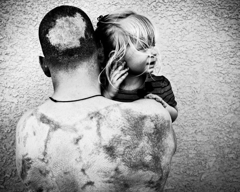 <strong>Army Spc Robert Bernier and daughter Layla</strong>