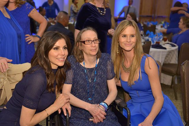Heather Dubrow (left) and Meghan King Edmonds (right) from Real Housewives of Orange County take a photo with a fellow cancer survivor, Sharon Parrett, during Fight CRC's Call-on Congress in Washington, D.C.