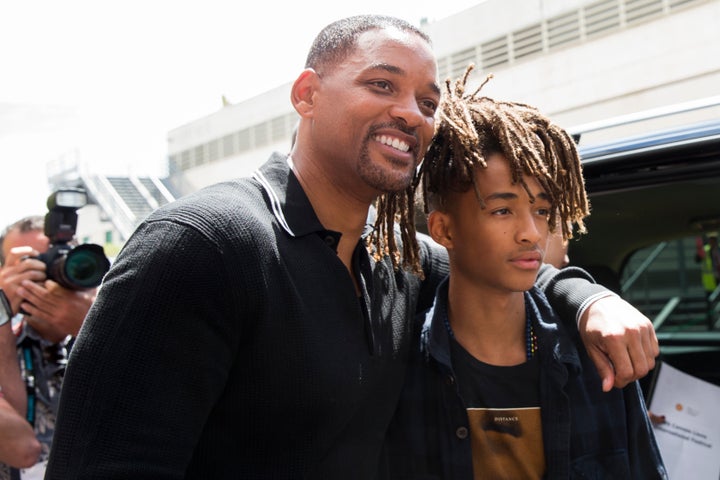 Will Smith and his son Jaden Smith pose outside the Palais after 'The Pursuit of Impact' seminar during the Cannes Lions Fest