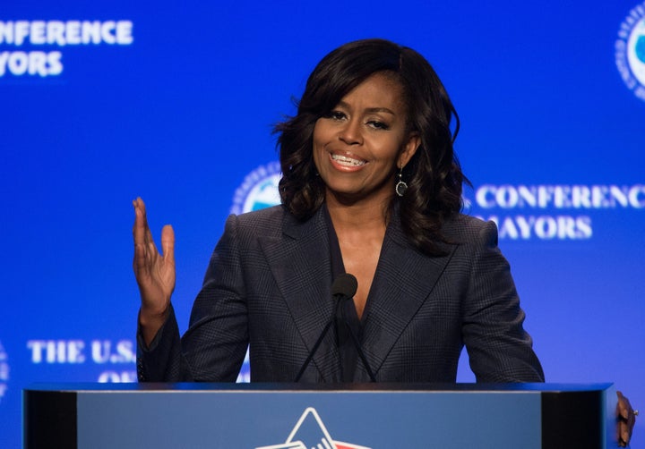 US First Lady Michelle Obama speaks about the Administration's efforts to end veteran homelessness and the importance of mayoral leadership in the process at the 84th annual Winter Meeting of The United States Conference of Mayors in Washington, DC, on January 21, 2016. / AFP / Nicholas Kamm