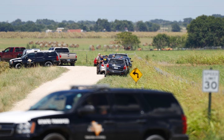 Authorities investigate the site in Maxwell, Texas where a hot air balloon crash killed 16 people on July 30, 2016. The pilot