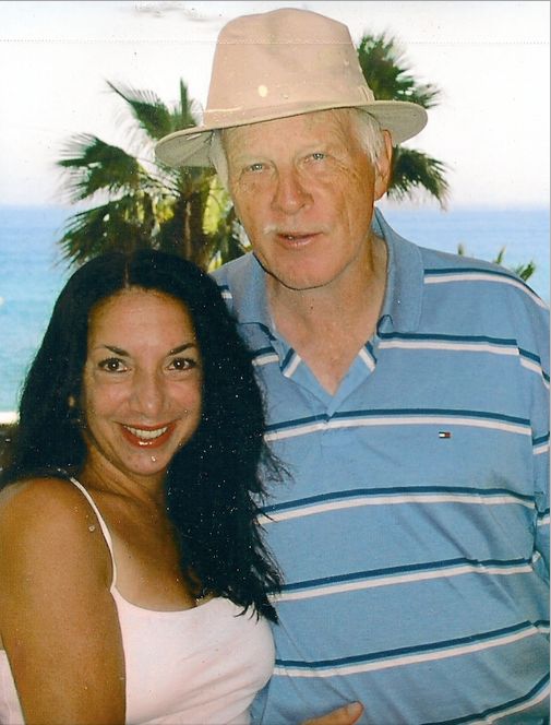 The author and her husband on a vacation before his illness.