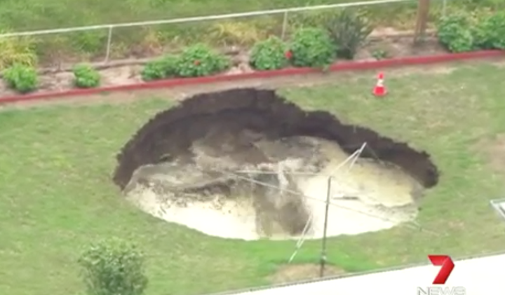 Churning waters in the huge sinkhole