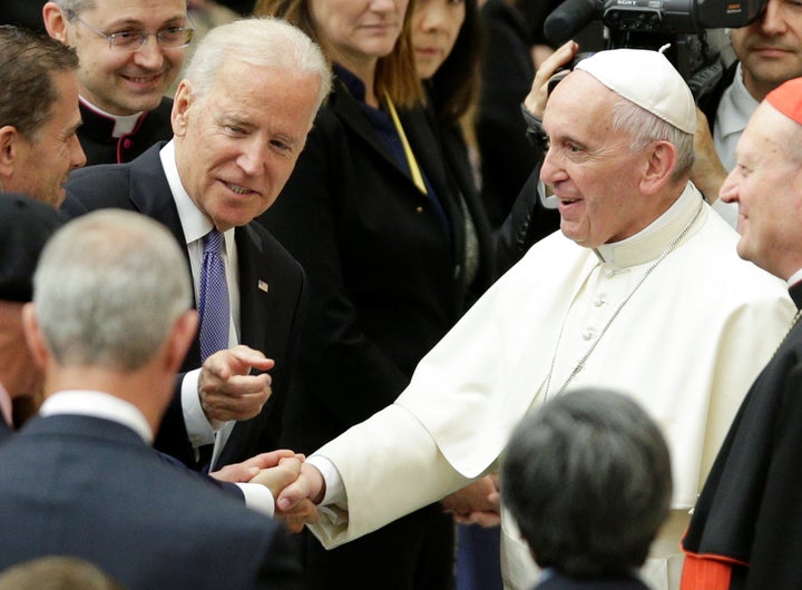 Vice President Joe Biden talks with Pope Francis in Paul VI hall at the Vatican on April 29, 2016.