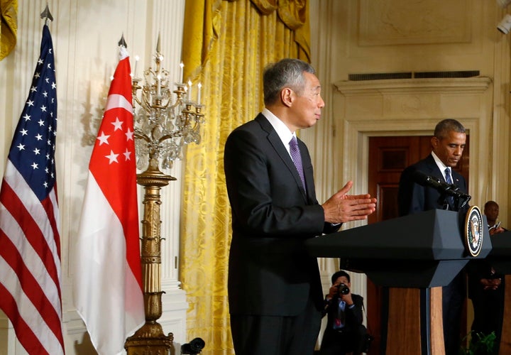 Singapore Prime Minister Lee Hsien Loong addresses a joint news conference with U.S. President Barack Obama (R) at the White House in Washington, U.S., August 2, 2016.