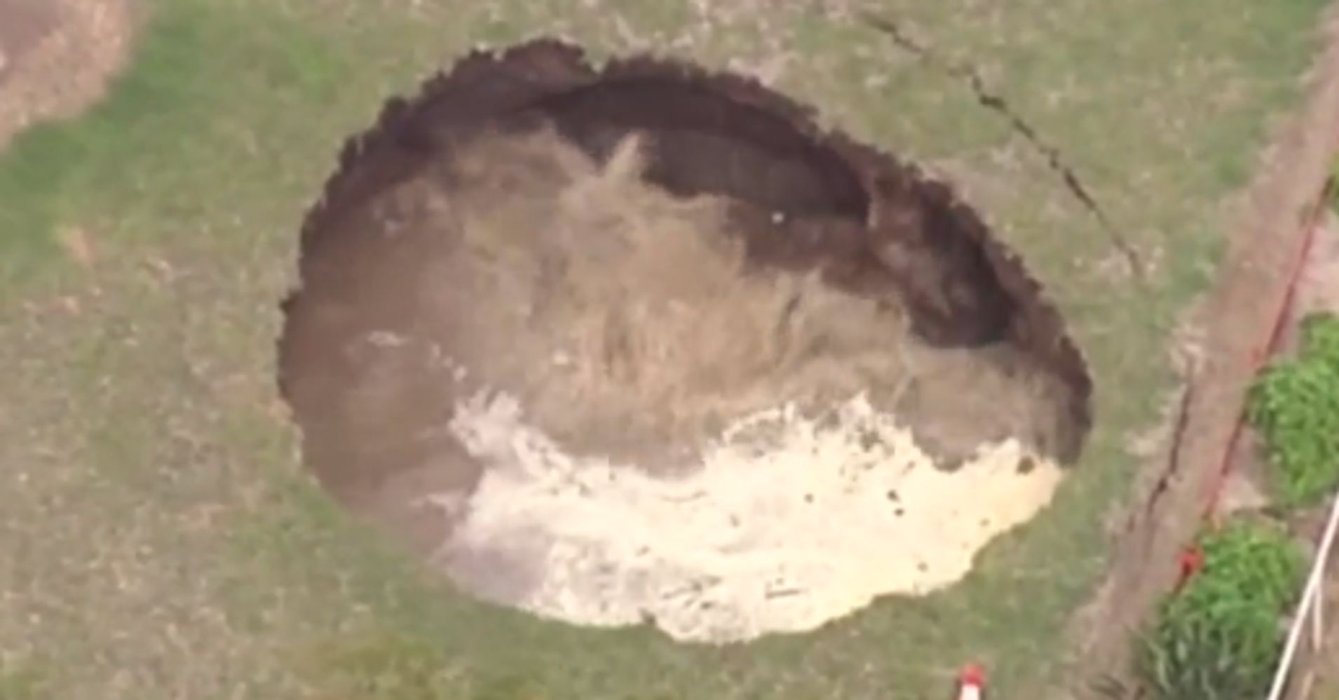 Massive, Churning Sinkhole Swallows Couple's Backyard In Australia ...