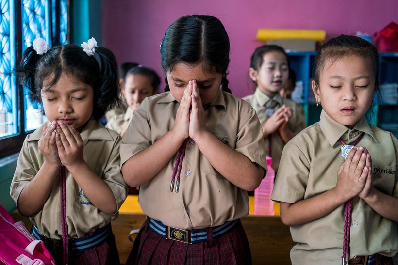 <i>Morning prayer at the Meridian International School, one of the most diverse, progressive, and high achieving schools in K