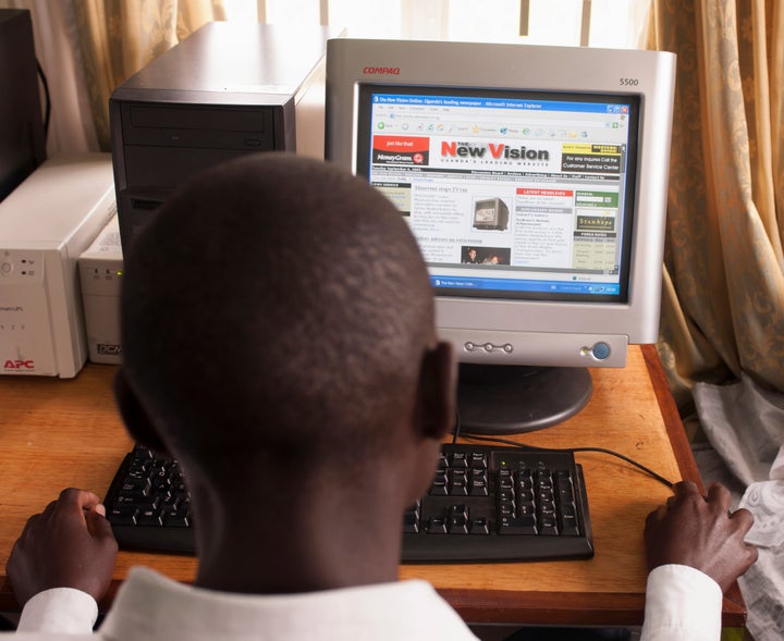 A man reads the website of Ugandan newspaper New Vision, which reported this week on the country's new porn detection machine.