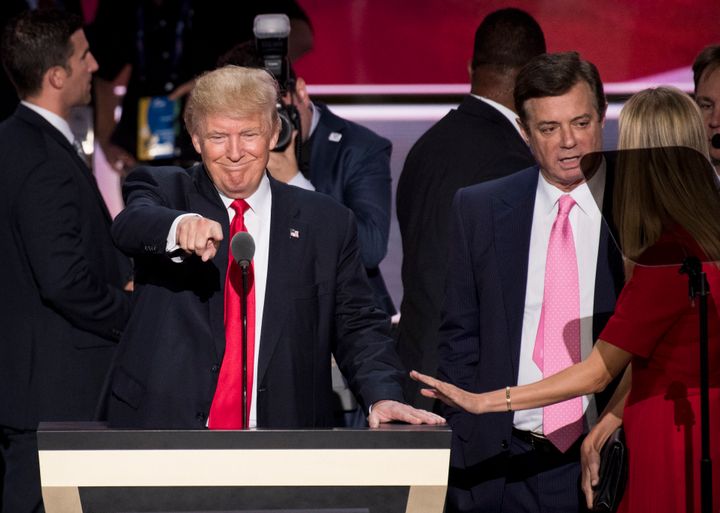 Donald Trump, flanked by campaign manager Paul Manafort and daughter Ivanka, checks the podium at the 2016 Republican National Convention in Cleveland on July 20.