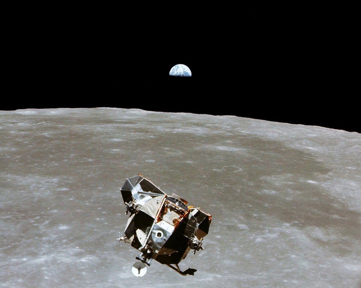 The Apollo 11 Lunar Module ascent stage, with astronauts Neil A. Armstrong and Edwin E. Aldrin Jr. aboard, is photographed from the Command and Service Modules in lunar orbit in this July, 1969 file photo.