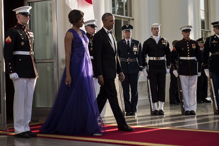 A purple gown by American-based Japanese designer Tadashi Shoji for the 2015 White House state dinner for Japanese Prime Minister Shinzo Abe.