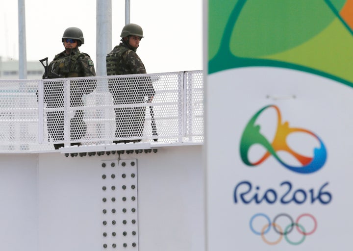 Soldiers stand at a station on Metro Line 4.