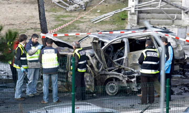 ETA has been held responsible for killing more than 800 people, including more than 300 civilians in the name of Basque separatism in northern Spain. This image shows the wreckage after a bomb exploded near a Madrid convention centre in February 2009 after ETA rebels telephoned a warning