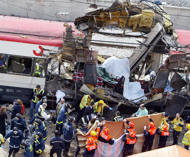 Photo taken 11 March 2004 of emergency services at the scene of the Madrid train bombing disaster.