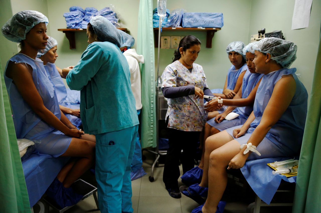 Women prepare for sterilization surgery at the hospital.