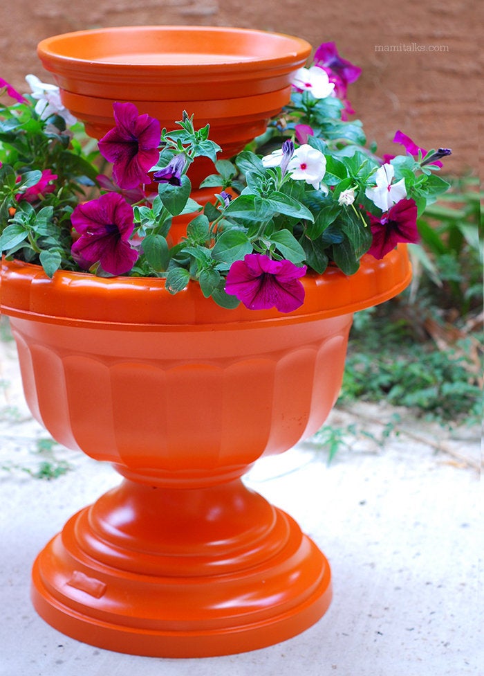 A vibrant bird bath makes for a great garden centerpiece.