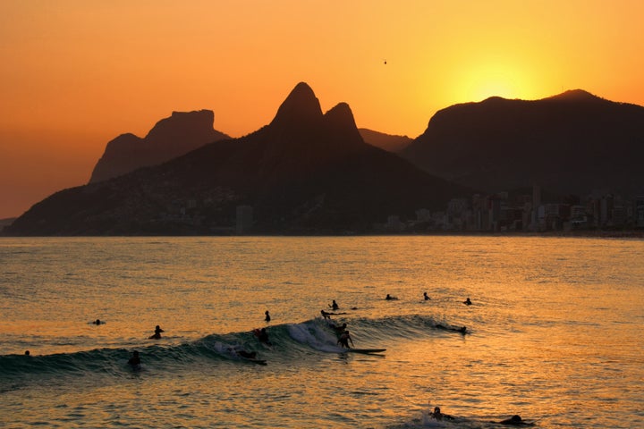 Sunset over Rio de Janeiro with Morro Dois Irmãos in the background. 