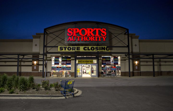 A shopping carts stands outside of a Sports Authority Inc. store in Matteson, Illinois, U.S., on Tuesday, May 24, 2016.