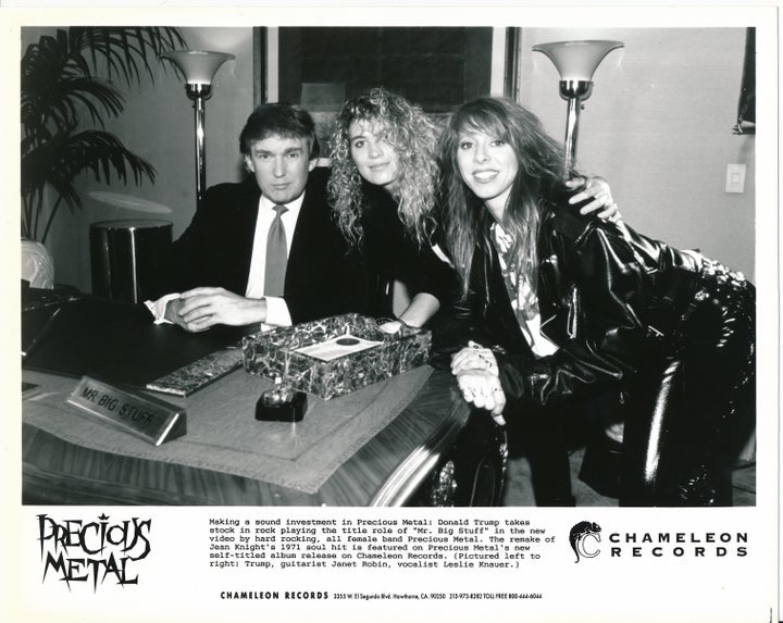 Donald Trump seated next to Janet Robin (guitarist) and Leslie Knauer (vocalist) of Precious Metal. Courtesy eBay user eclecticbyelynn.