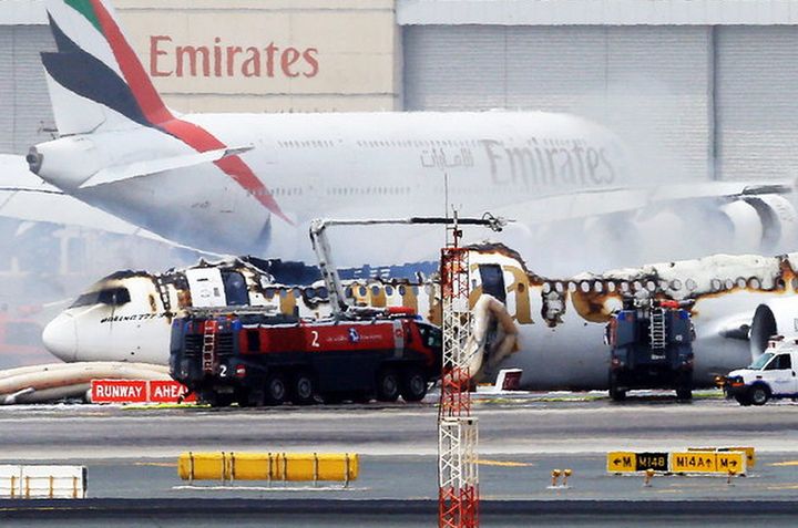 The Emirates plane on the tarmac at Dubai International Airport