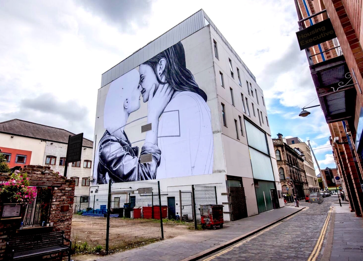 The two women featured in the mural traveled to the U.S. to get married, because same-sex marriage is banned in their home country. 