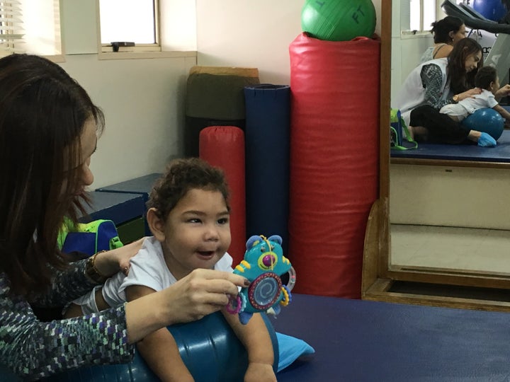 Dr. Ana Patrícia treats José Bernardo, who was born with microcephaly.