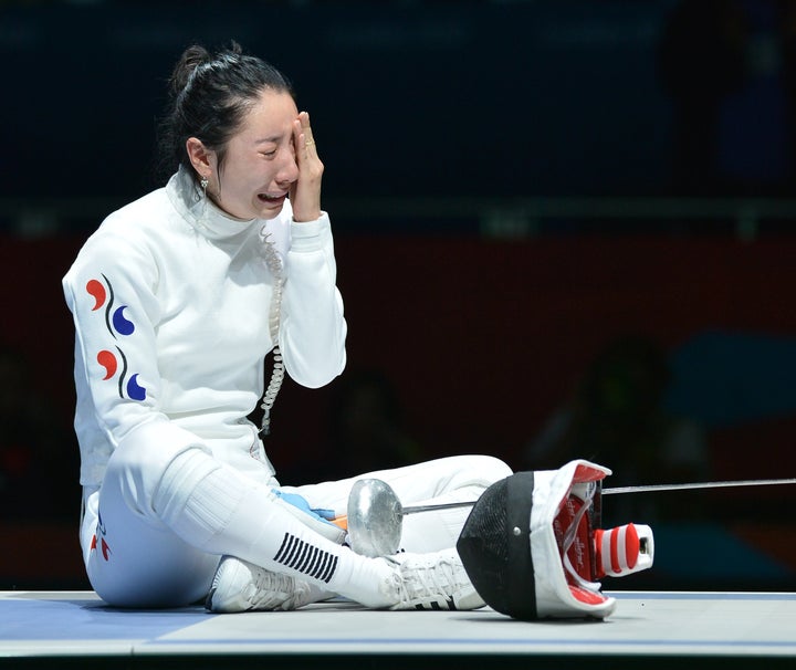 <strong>Shin Lam cries as the dispute continues over her match against Britta Heidemann</strong>