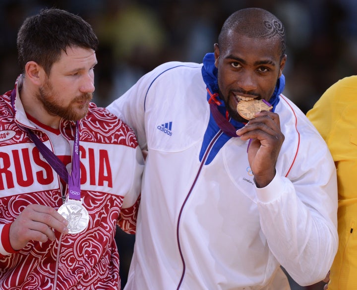 1+1=2:Judoka Alexander Mikhaylin (next to France’s Teddy Riner)