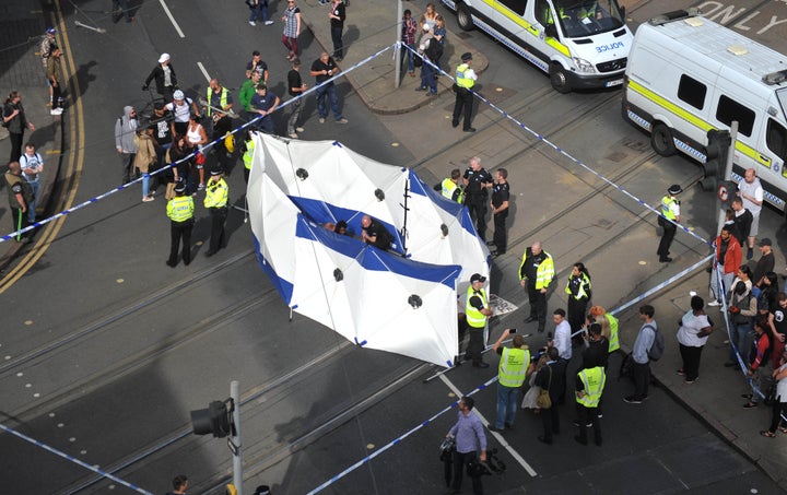 Activists outside Nottingham Theatre Royal shut down part of the city centre tram and bus network to protest for social justice movement Black Lives Matter.