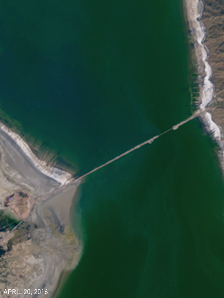 Close-Up. The waters surrounding the Lake Urmia bridge shifted from green on April 20 to red by July 9.