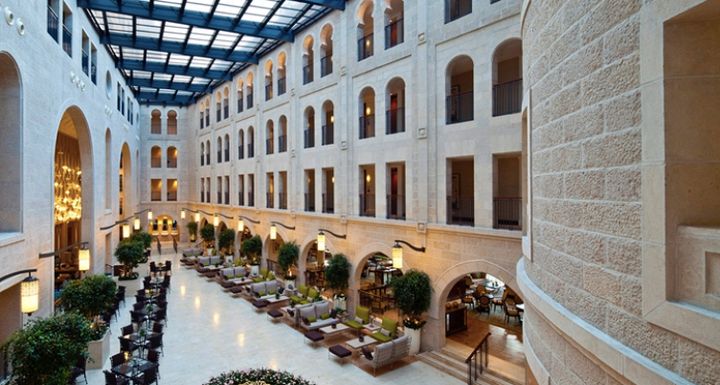 The lobby atrium of the Waldorf Astoria Jerusalem