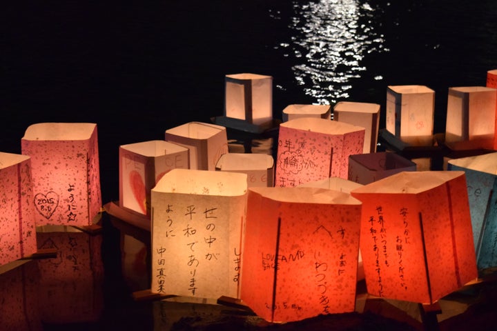 People from all over the world write messages of peace on paper lanters to commemorate the anniversary of the bombing.