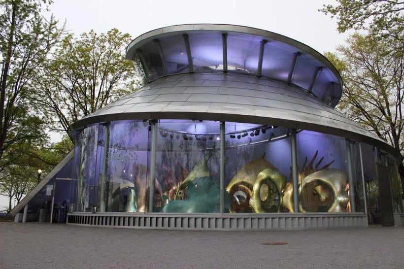 The Sea Glass Carousel glows luminescent at night