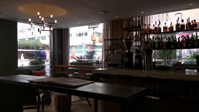 Neighborhood views can be glimpsed from the bar