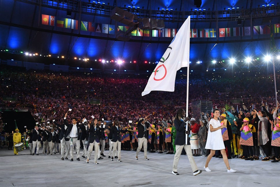 Refugee Olympic Team's flag bearer Rose Nathike Lokonyen leads the delegation during the opening ceremony of the Rio 2016 Oly