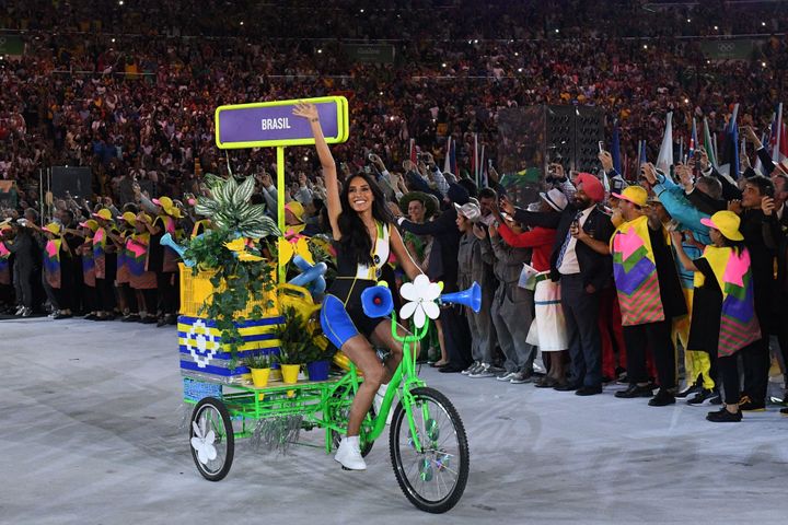 <strong>A woman on a bicycle leads the Brazil delegation during the opening ceremony of the Rio 2016 Olympic Games at the Maracana stadium in Rio de Janeiro.</strong>