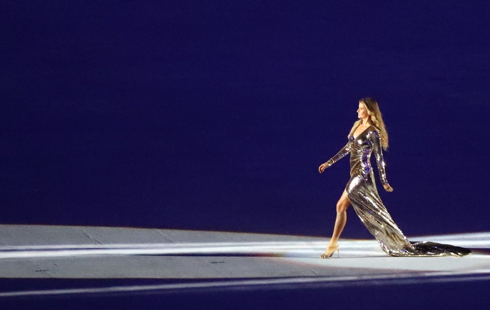 Brazilian model Gisele Bundchen takes part in the opening ceremony.