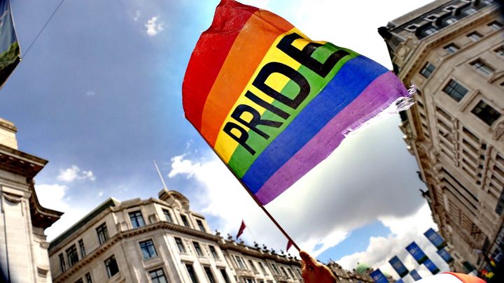 The rainbow flag flying high at London Pride in June