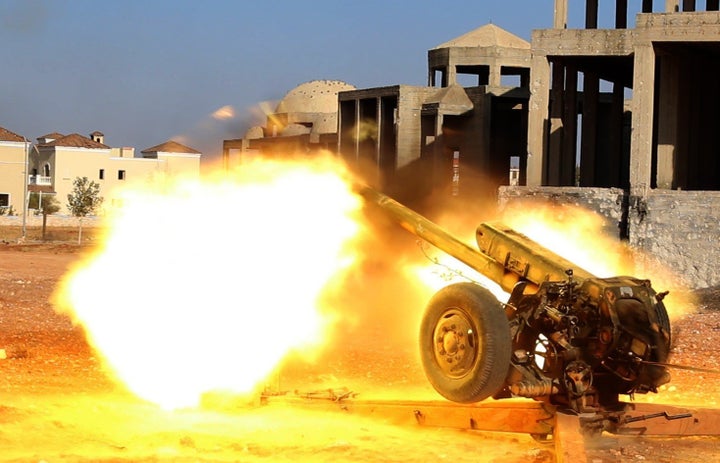 Opposition forces attack the artillery college in Aleppo on Friday. Taking control of the military complex would isolate gove
