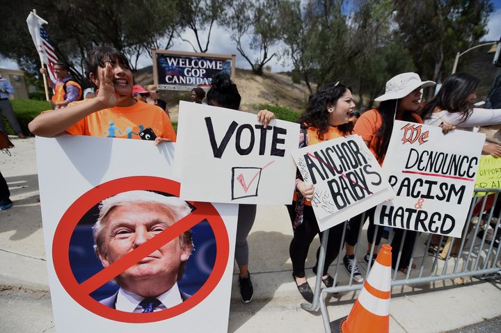 Latinos protest Trump outside the Republican presidential debate in Simi Valley, California, Sept. 16, 2015.