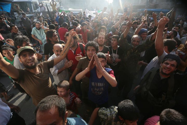 Syrian rebels said they had broken through to besieged opposition-held areas in eastern Aleppo on Saturday. Above, rebels and civilians celebrate in Aleppo.