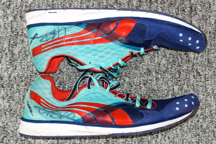 Autographed training shoes donated by Usain Bolt