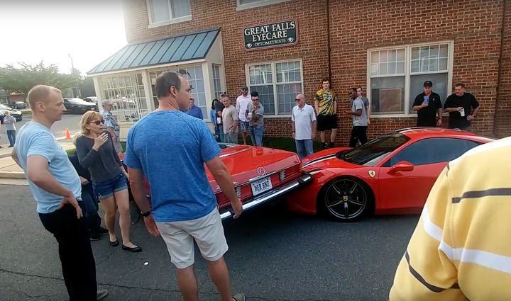 A man who appears to be the Ferrari's owner is seen confronting the shellshocked family.